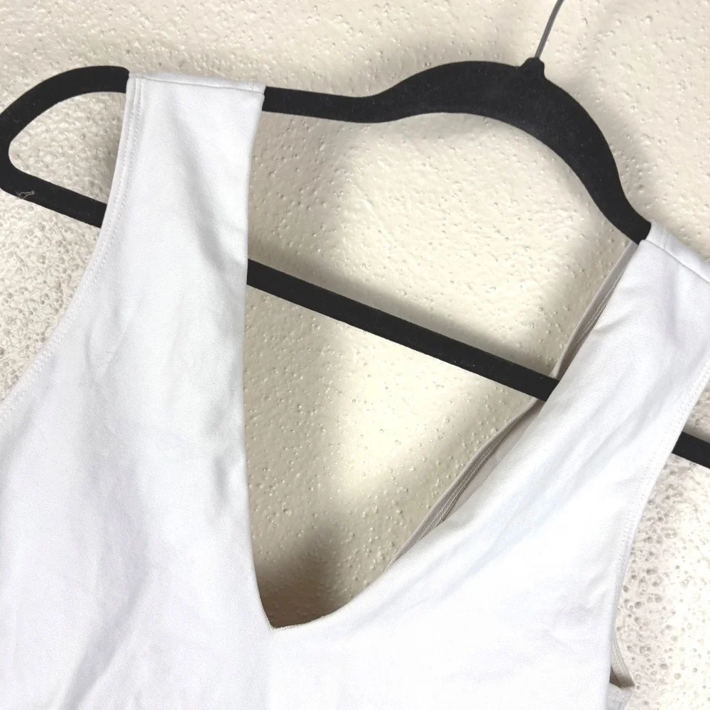 Free People Keep It Sleek White V-Neck Thong Bodysuit Size M Sleeveless Top